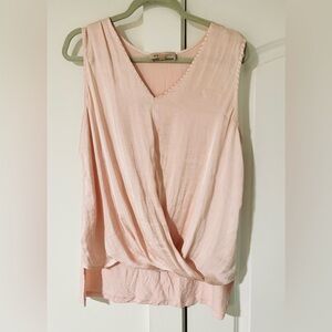 Pink sleeveless v neck blouse